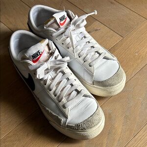 Nike Women’s White Sneakers with Black Swoosh size 7.5US